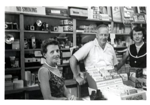 Pioneer Camera Shop - Bill and daugther, Patricia Wood with family friend