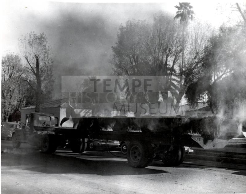Smoking Bales on Truck Flatbed Trailer in front of Tempe City Hall