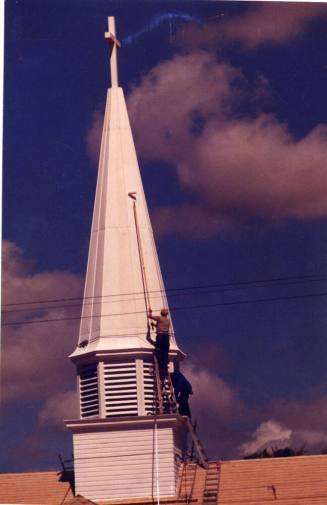 Photograph of men painting steeple of the First Congregational Church of Tempe