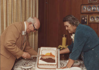 Howard Pyle Cutting Birthday Cake