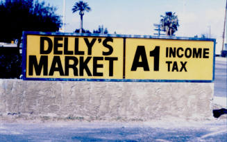 Delly's Market and A1 Income Tax Signs, 1601 E. Apache