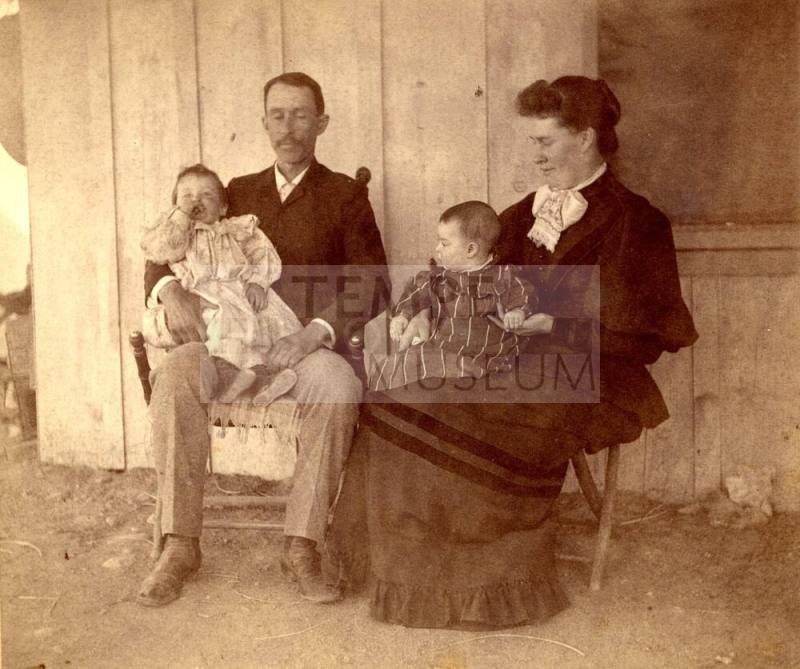 John and Mary Johnson Holding Children, Lucile and Vera