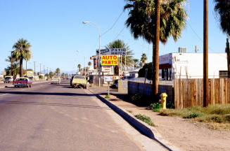 Signs along 2001 block of Apache Blvd.