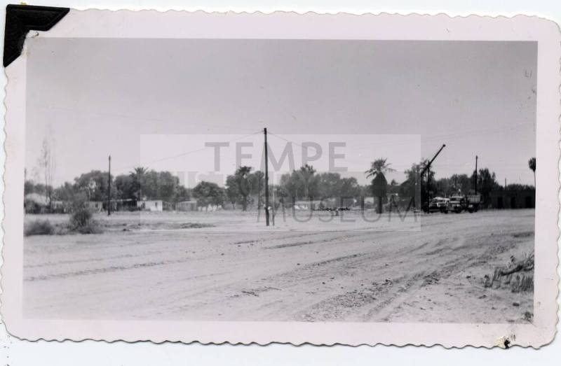 Photograph - 6th St. and East in 1957 - View of Cleared field and truck