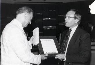 Photo of Bill Ream Receiving Proclamation