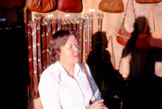 Woman at 1977 Haydens Ferry Arts & Craft Fair leather booth
