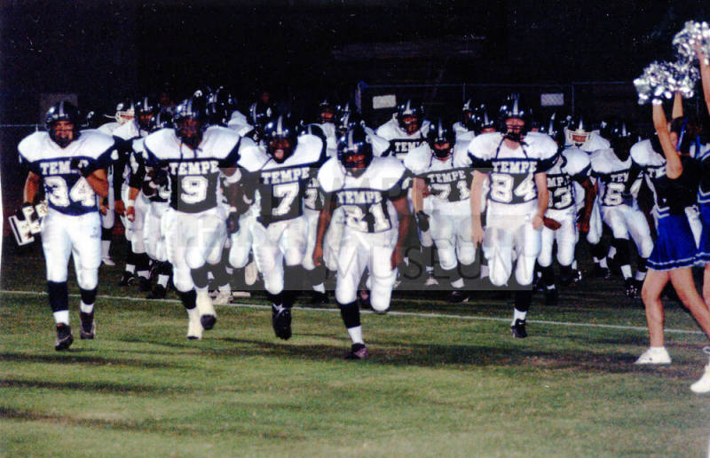 Tempe High School - Football Players Running onto Field