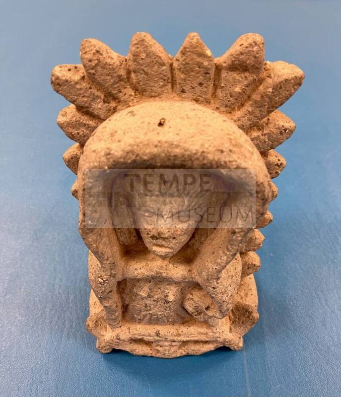 Stone figurine, possibly Virgin of Guadalupe