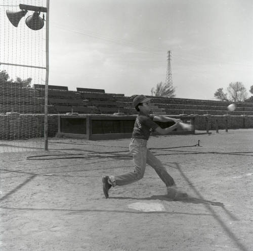 Young Boy Swinging at a Baseball at Tempe Beach Park