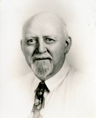 Professional headshot of Dr. Fenn J Hart in his later years