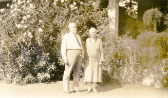 Close-up of Dr. Fenn J Hart and his wife Rosa Brown Hart outside their home in Phoenix