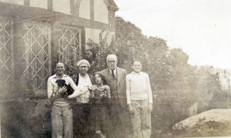 Group photo of Dr. Fenn J Hart, his wife Rosa Brown Hart and three of their grandchildren Earl, Rosemary and Fenn Hart