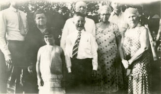 Group photo of Dr. Fenn J Hart, his wife Rosa Brown Hart, and six unknown individuals