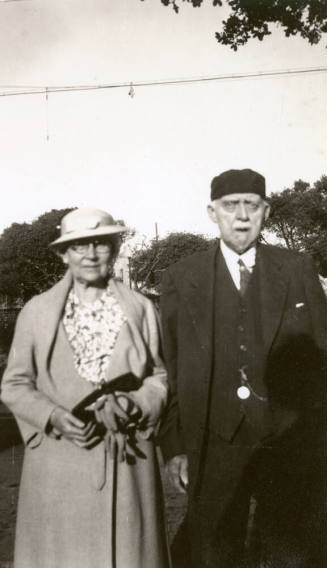 Snapshot of Rosa Brown Hart and Dr. Fenn J Hart wearing a cap backwards