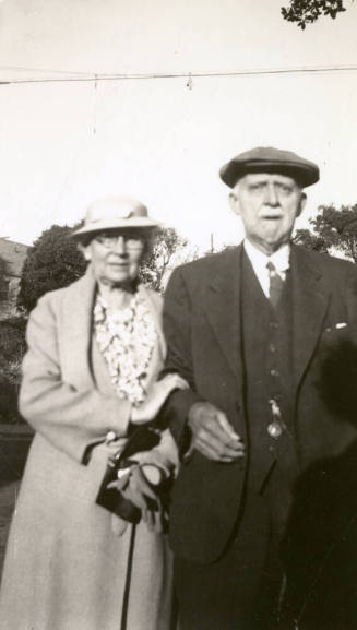 Duplicate snapshot of Dr. Fenn J Hart standing outside next to his wife at an unknown location