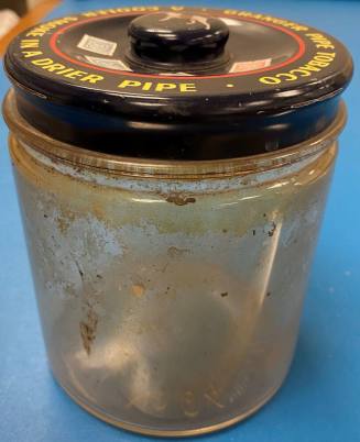 Glass Granger pipe tobacco jar with metal lid