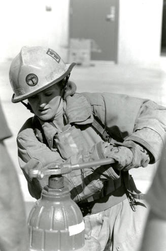 Tempe Fire Department Firewoman using Hydrant Wrench