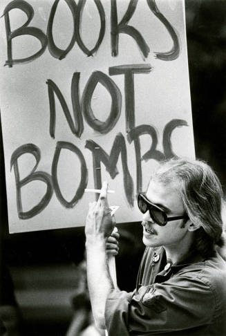 Arizona State University Student with Anti-War Protest Poster
