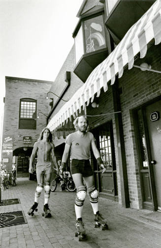 Two Roller Skaters on Mill Avenue
