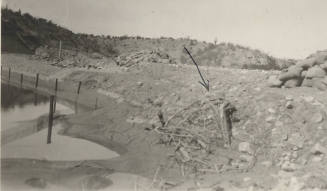 Photo- brush and gravel dam, and sink hole, at the Salt River Intake