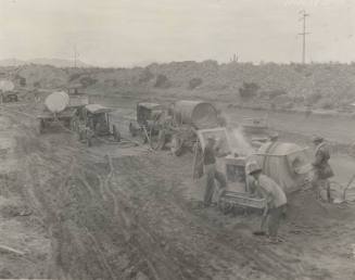 Photo-workers using portable Guniting plant to repair Great Eastern Canal lining