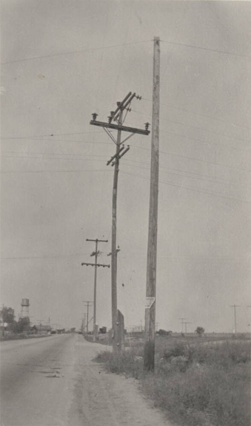 Photo- power lines along a road