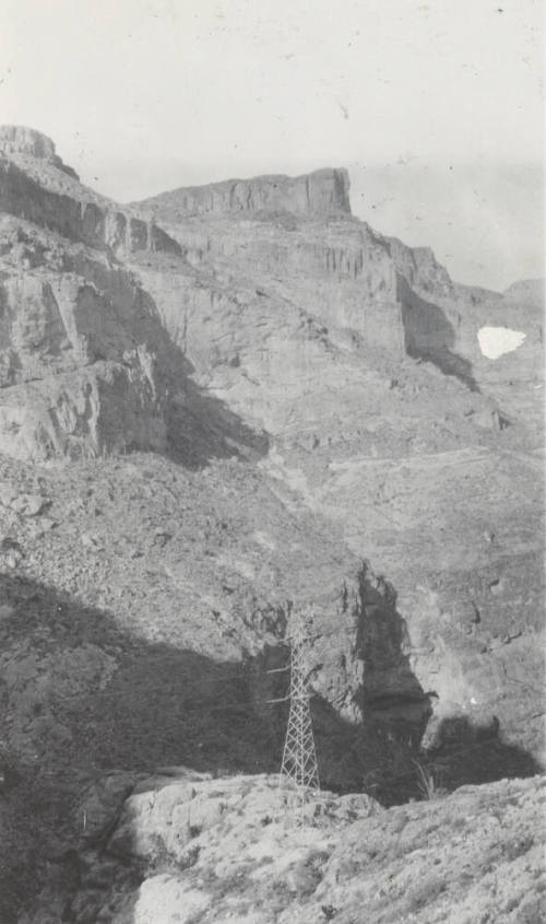 Photo- Miami-Superior line tower in rugged canyon
