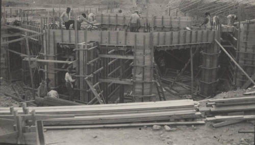 Photo-View of construction workers building forms for a concrete pour