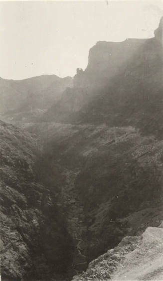Photo- View of a river bed and canyon gorge cutting through mountains