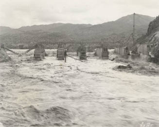 Photo- View of a flooded Verde River during the construction of Bartlett Dam