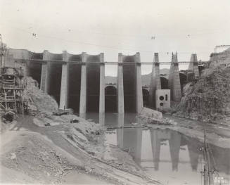 Photo-View of dam construction from the base of Bartlett Dam