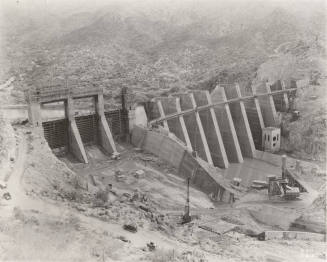 Photo-A view of the construction of Bartlett Dam from the hillside above the dam
