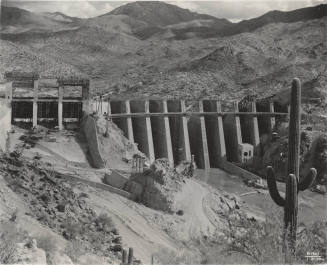 Photo- Frontial view of the partial construction of Bartlett Dam