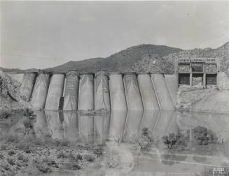 Photo- Frontial view of the construction of Bartlett Dam nearing completion