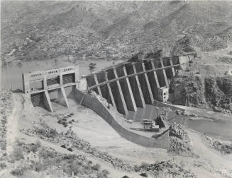 Photo- View of Bartlett Dam and spillway gate under construction
