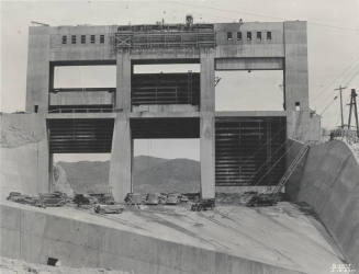 Photo- View of Bartlett Dam and spillway gates under construction