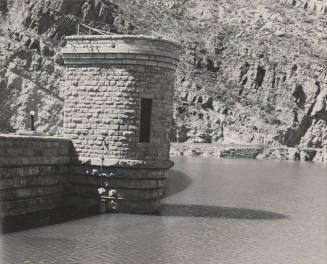 Photo-Close-up view of portion of Roosevelt Dam and the lake