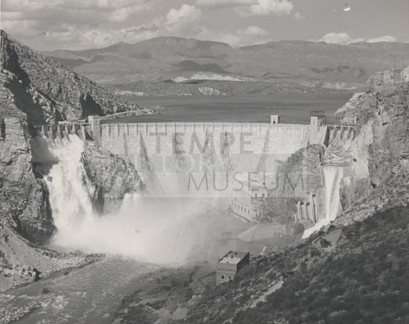 Photo-View of Roosevelt Dam releasing water through the spillways