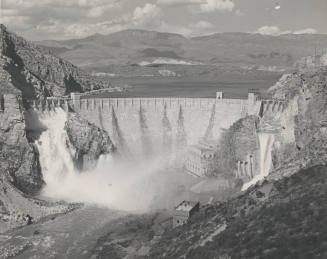 Photo-View of Roosevelt Dam releasing water through the spillways