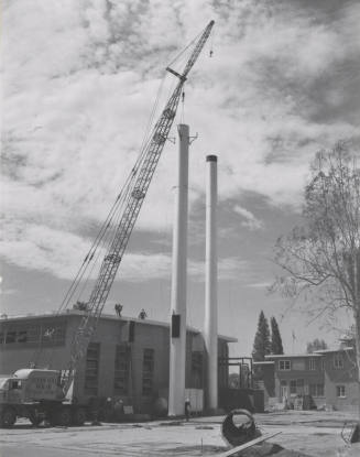 Construction crane and installation of smoke stacks at Arizona State University