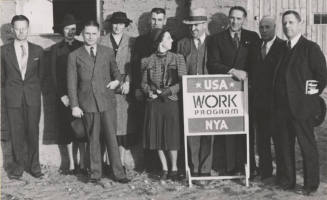 WPA staff members stand in front of B.B. Moeur Activity Building at ASU (still under construction)