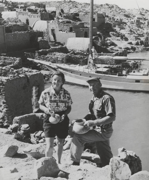 Irving and Exy Johnson in the Upper Nile Valley Admiring Pottery Made in Nubia