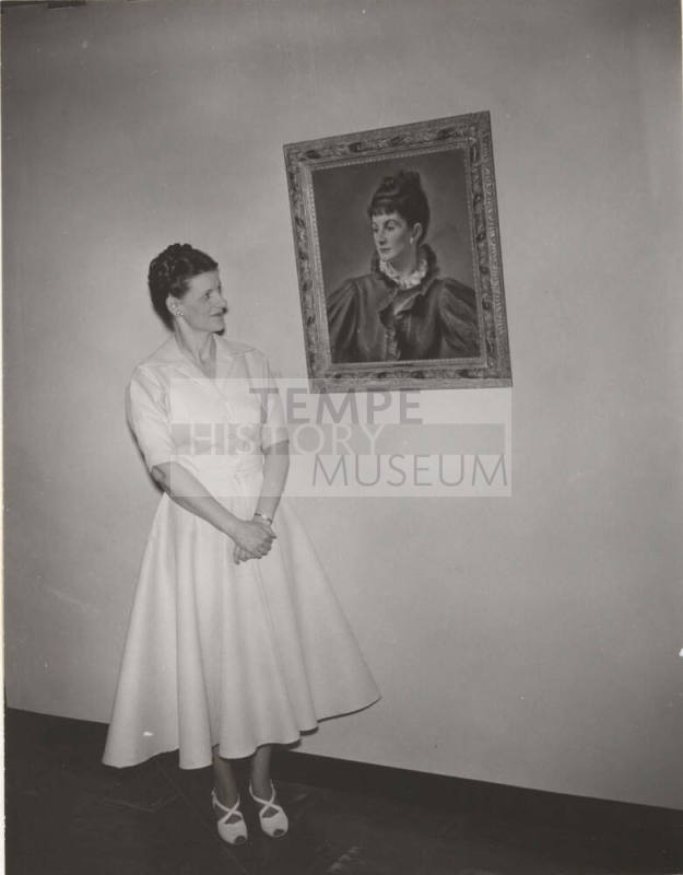 Mrs. Kathryn Gammage Standing Next to a Portrait of Andree Ruellan