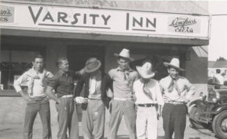 Group Photograph of Men Standing in Front of Varsity Inn