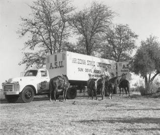 Horses and Riders by an Arizona State University Sun Devil Rodeo Truck