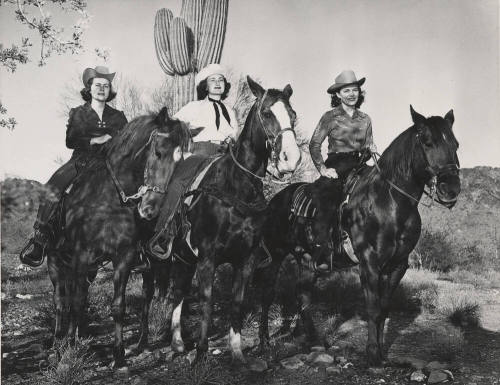 Lady Riders in Front of Cactus in the Desert