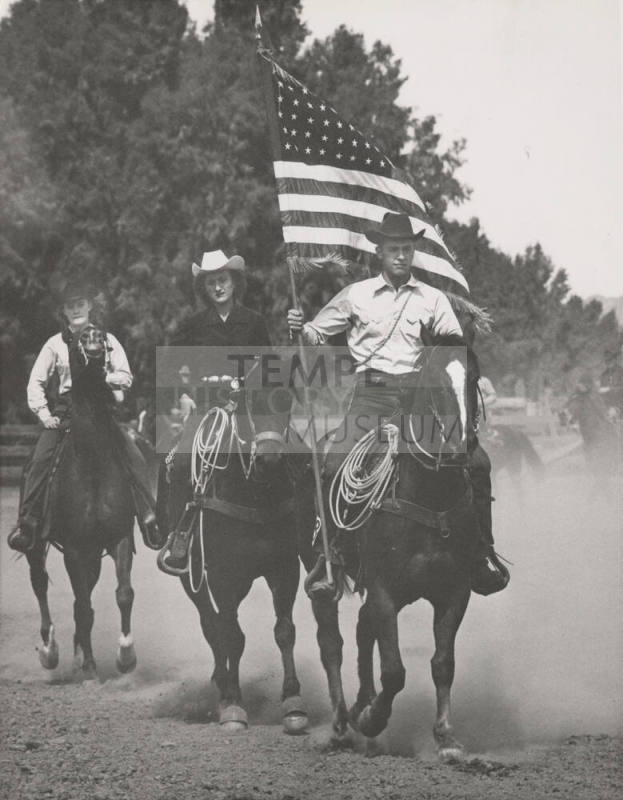 Horseback Riders Carrying a United States Flag