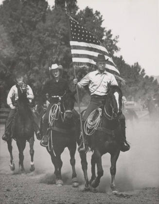 Horseback Riders Carrying a United States Flag
