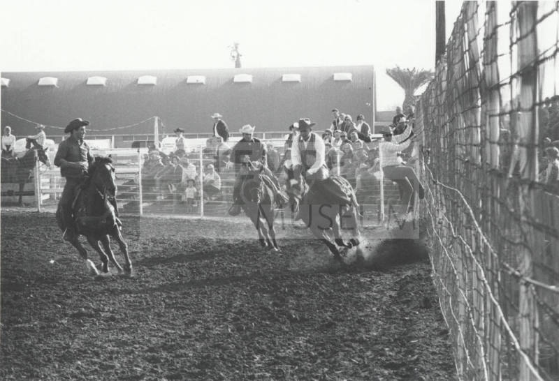 Bronc Rider Beats the Buzzer at the Rodeo