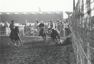 Bronc Rider Beats the Buzzer at the Rodeo